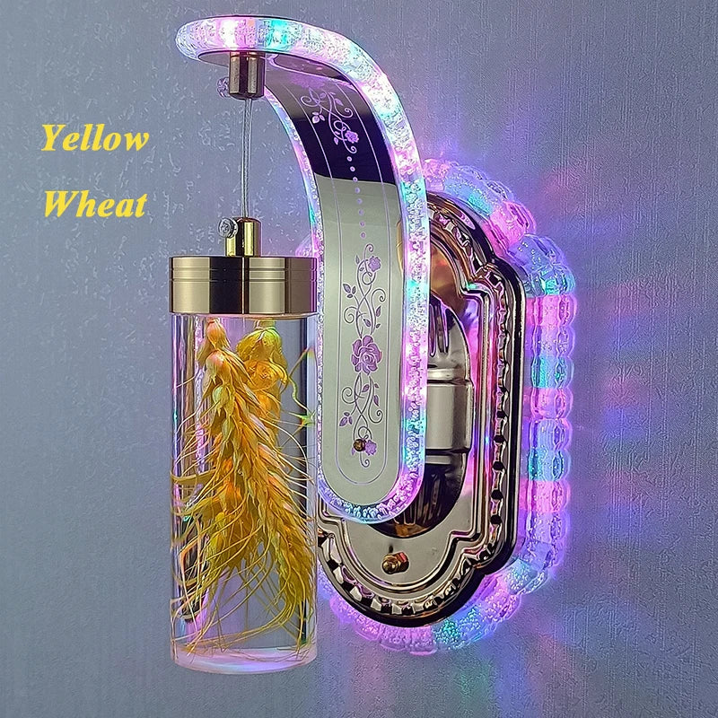 Decorative wall light with colorful LED accents and a yellow wheat sample inside a glass container.