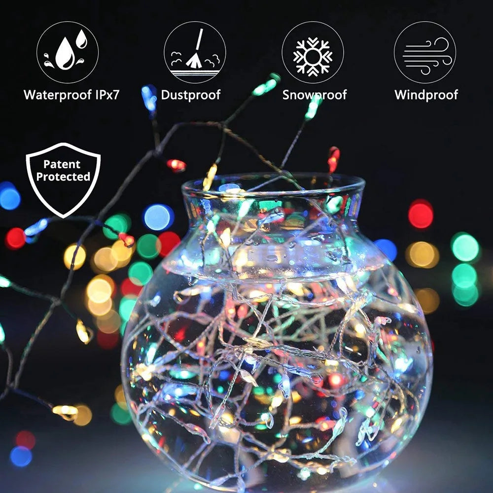 Decorative string lights on a clear glass vase with waterproof and patent protected icons.