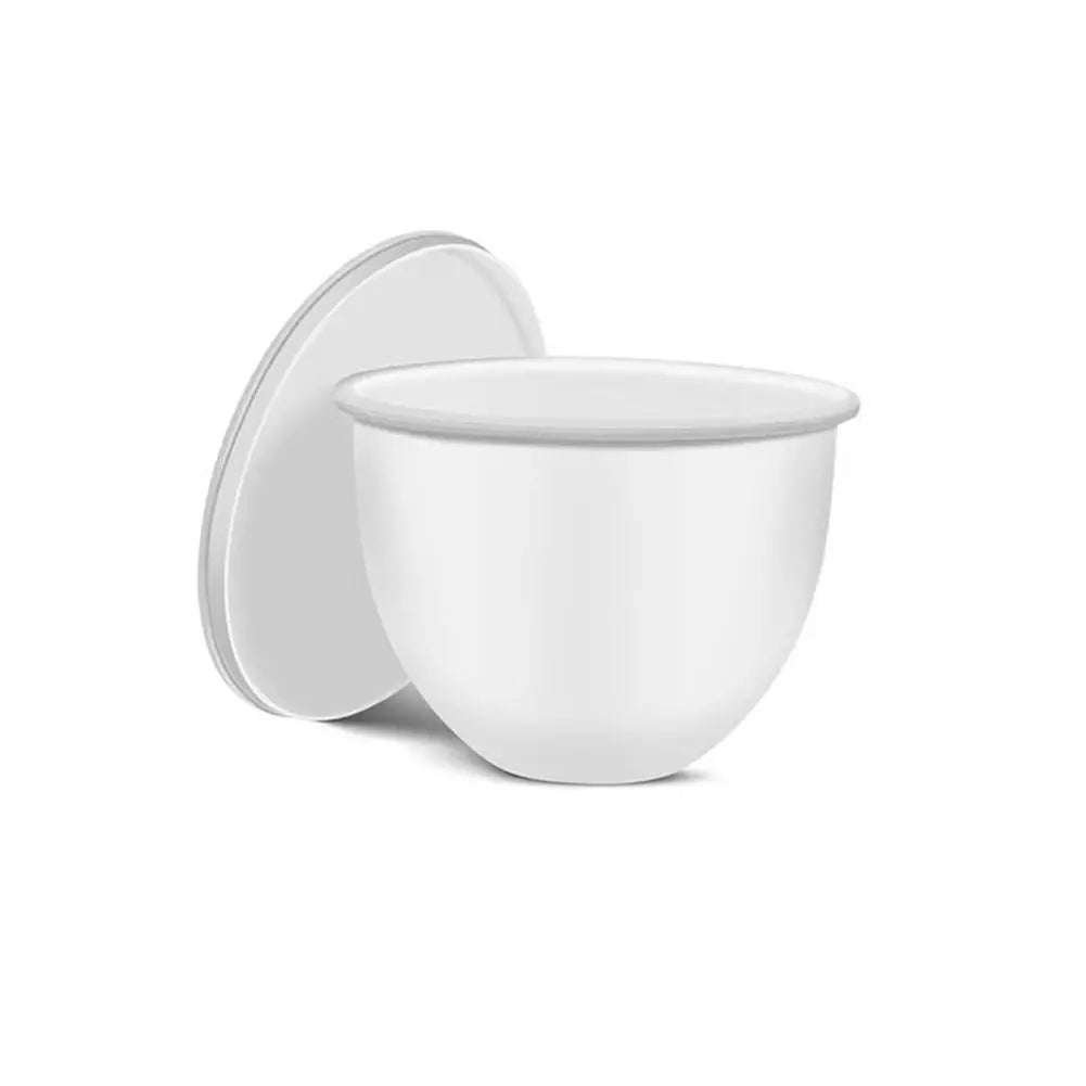 White ceramic bowl with lid on a white background