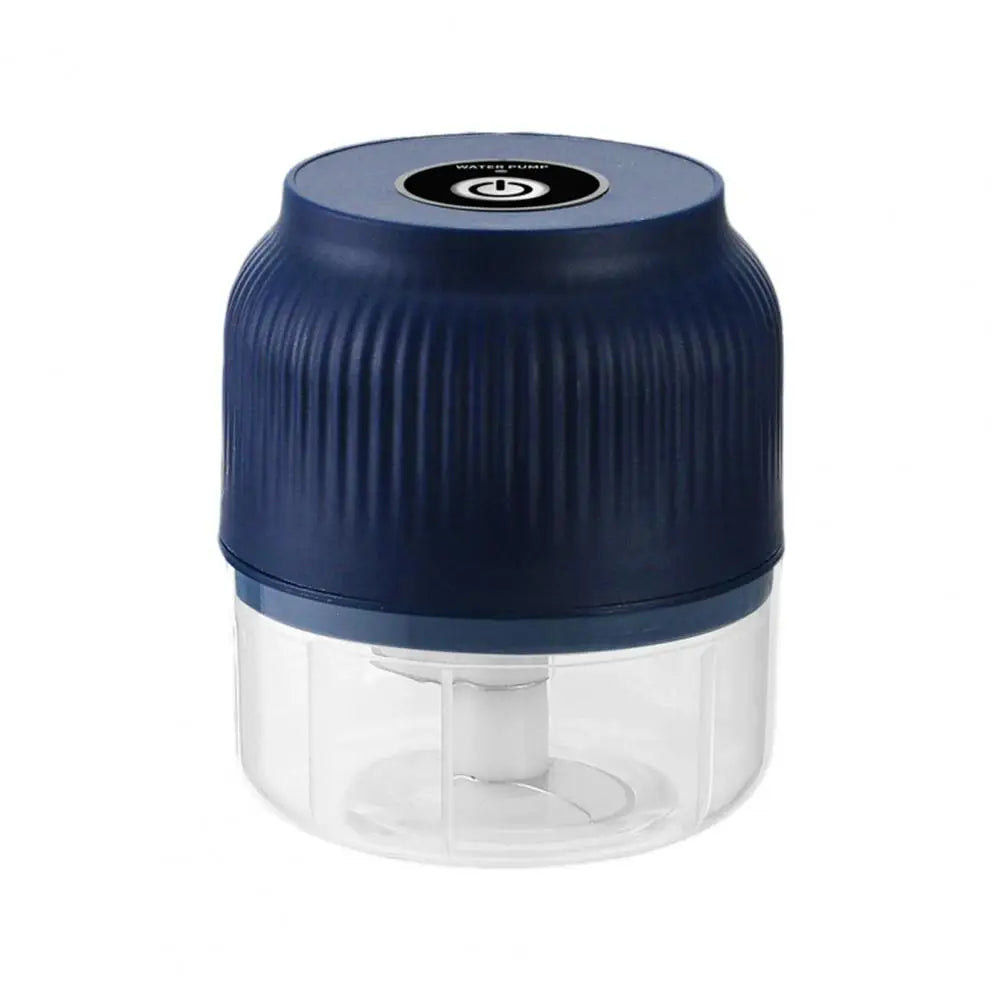 Blue and clear handheld food chopper on a white background
