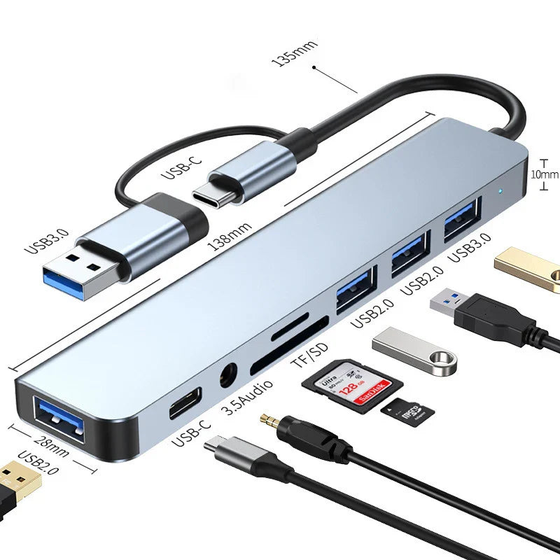 Multifunctional USB hub with various ports and cables on a white background
