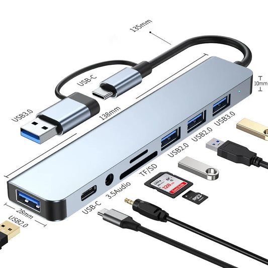 Multifunctional USB hub with various ports and cables on a white background