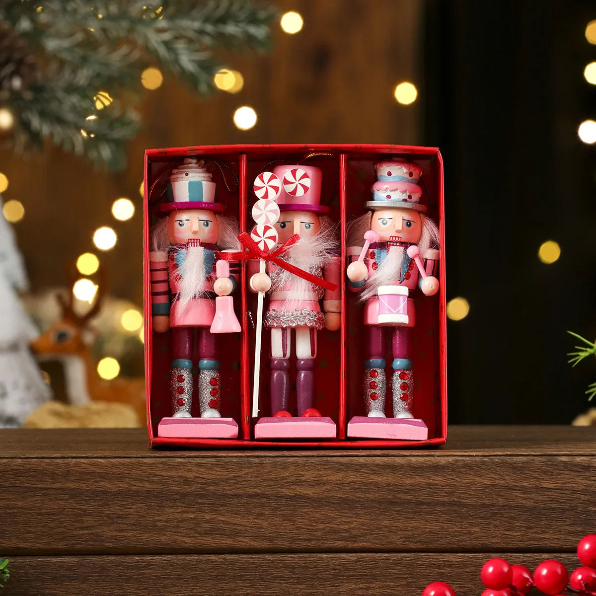 Three decorative nutcrackers in a red box with a festive background
