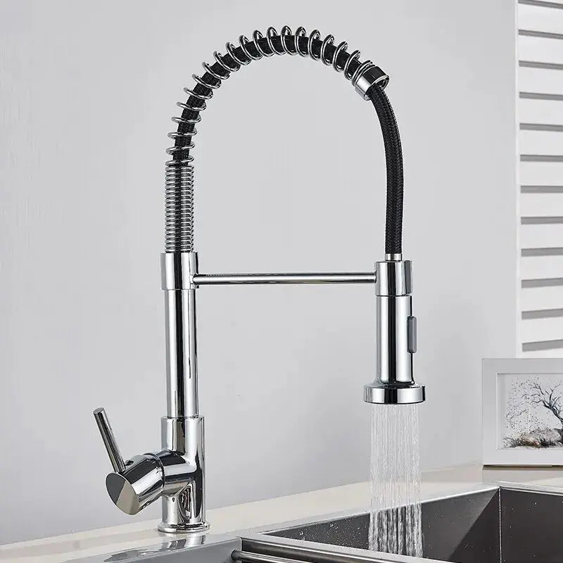 Chrome kitchen faucet with a pull-down sprayer on a light gray background
