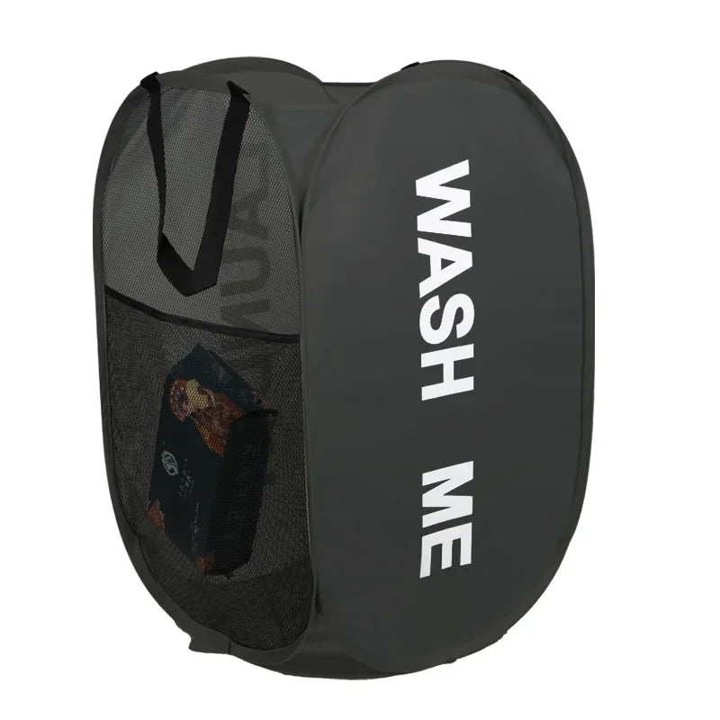 Black laundry bag with 'WASH ME' text on a white background