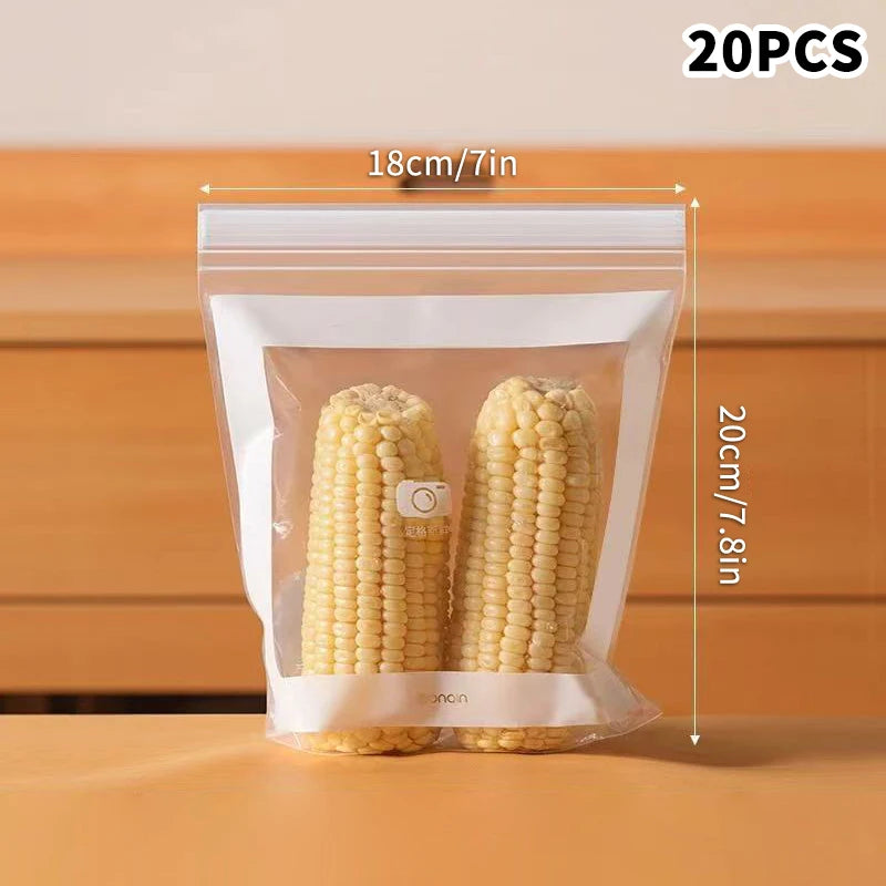 Clear plastic bag with two ears of corn and measurements on a wooden surface