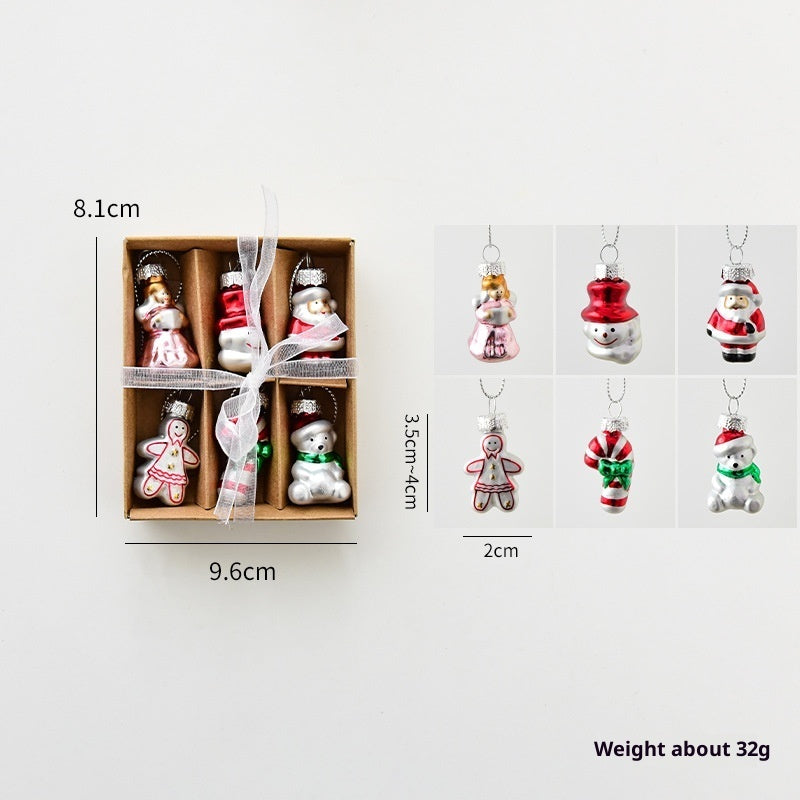 Set of Christmas ornaments in a box with dimensions and weight information.