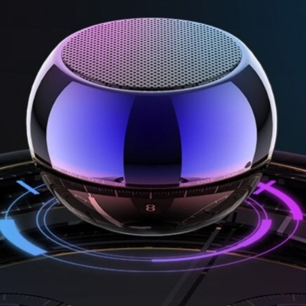 Spherical electronic device with a reflective surface on a dark background